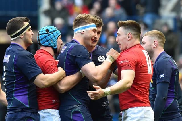 Scotland's flanker Jamie Ritchie confronts Josh Adams during the match at Murrayfield. Picture: AFP/Getty