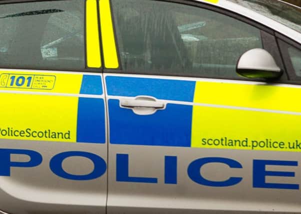 Police at the scene in Ford's Road. Picture: TSPL