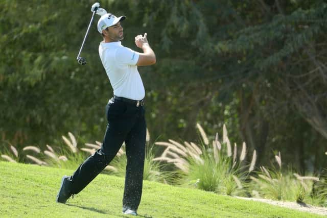 Oliver Wilson plays his second shot into the 10th green at Doha Golf Club. Picture: Warren Little/Getty Images