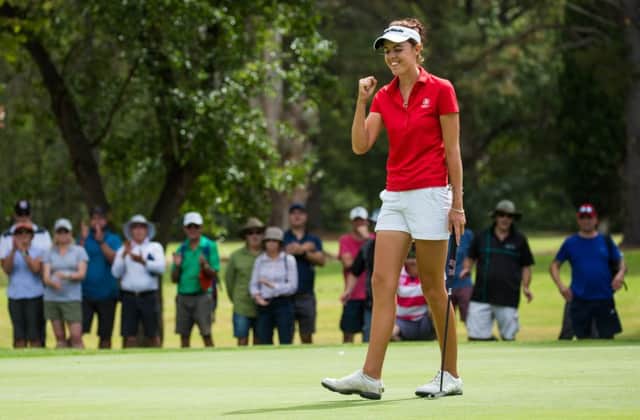 Meghan MacLaren celebrates after finishing with a birdie at Queenbeyan Golf Club, where she finished three shots clear of the field. Picture: Tristan Jones