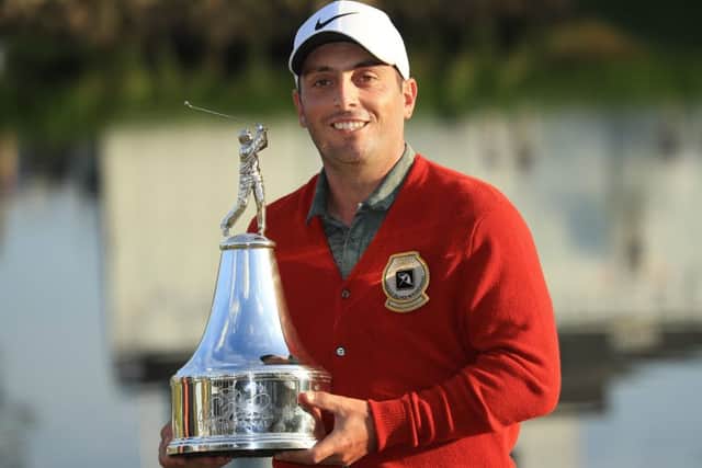 Francesco Molinari poses with the trophy after winning the Arnold Palmer Invitationalat Bay Hill in Florida. Picture: Getty Images