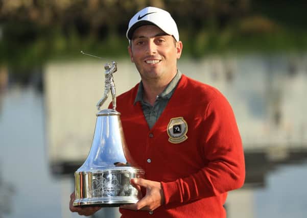 Francesco Molinari poses with the trophy after winning the Arnold Palmer Invitationalat Bay Hill in Florida. Picture: Getty Images