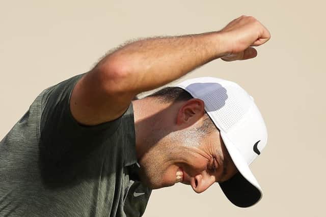 Francesco Molinari celebrates after rolling in his long birdie putt at the 18th for a closing eight-under-par 64. Picture: Getty Images