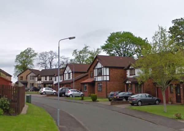 The woman was robbed at her home in Thorndeane, Elderslie. Picture: Google