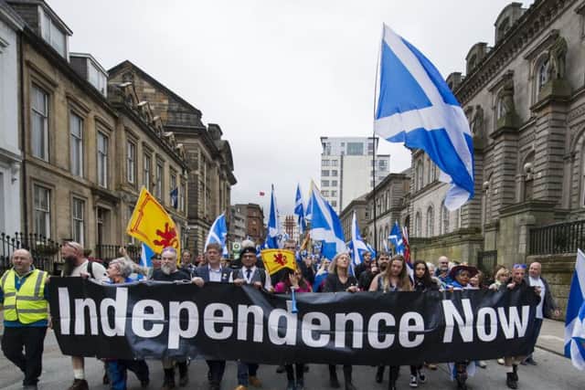 Pro-independence marchers head through Glasgow in May 2018. Picture: John Devlin