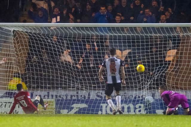 Liam Millar turns home Eamonn Brophys cross to snatch victory for Kilmarnock against St Mirren in Paisley. Picture: SNS.