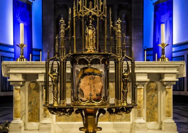 Part of St Margaret's shoulder bone has been removed from its reliquary by archaeologists seeking to find out more about the life of one of Scotland's most venerated figures. Picture:Andrew Fleming