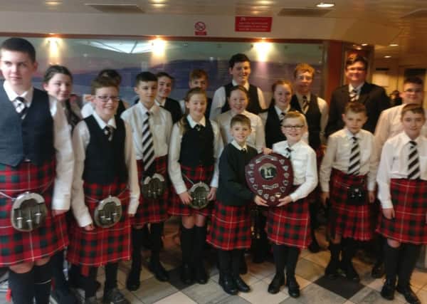 The Isle of Bute Schools Pipe band were crowned champions in the debut category at the Scottish Schools Pipe Band Championship.
