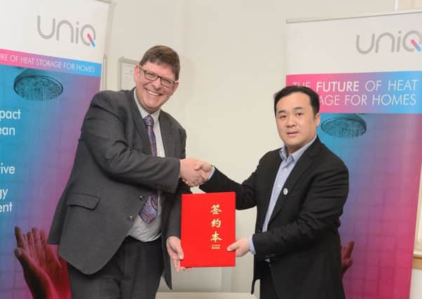 Sunamp CEO Andrew Bissell (left) with Gomon deputy general manager Tingwei Fan. Picture: Jon Savage