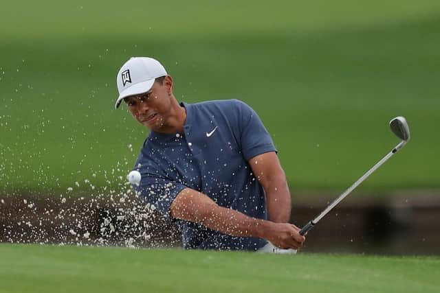 Tiger Woods plays out the bunker during a practice round for The Players Championship. Picture: Richard Heathcote/Getty Images