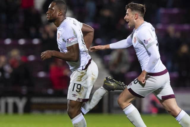 Marcus Godinho helps Uche Ikpeazu celebrate his first goal since August. Picture: SNS Group