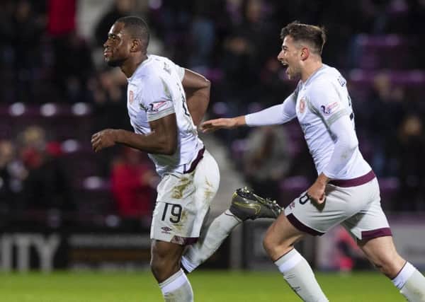 Marcus Godinho helps Uche Ikpeazu celebrate his first goal since August. Picture: SNS Group
