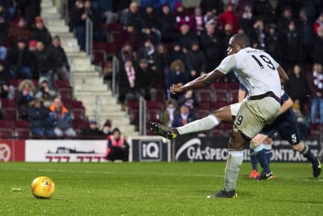 Hearts' Uche Ikpeazu saw his penalty saved by Partick Thistle keeper Conor Hazard. Picture: SNS