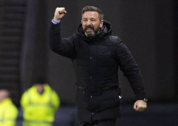 Derek McInnes celebrates as Aberdeen record their third win of the season over Rangers in Glasgow. Picture: SNS Group