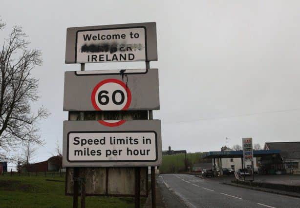 A vandalised 'Welcome to Northern Ireland' sign at the border. (Picture: Brian Lawless/PA Wire)