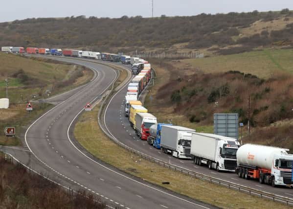 Lorries queue at the entrance to the Port of Dover in Kent. Picture: Gareth Fuller/PA Wire