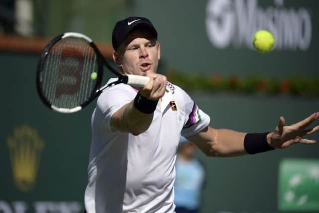 Kyle Edmund hits a forehand to Roger Federer at the Indian Wells Masters in California. Picture: AP