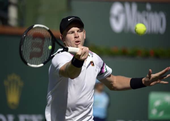 Kyle Edmund hits a forehand to Roger Federer at the Indian Wells Masters in California. Picture: AP