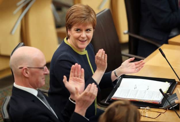 Nicola Sturgeon is facing MSPs at First Minister's Questions