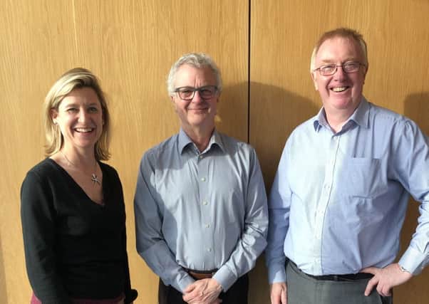 Headland MD Tim Holden (centre) with RSK's Sarah Mogford and Alan Ryder. Picture: Contributed
