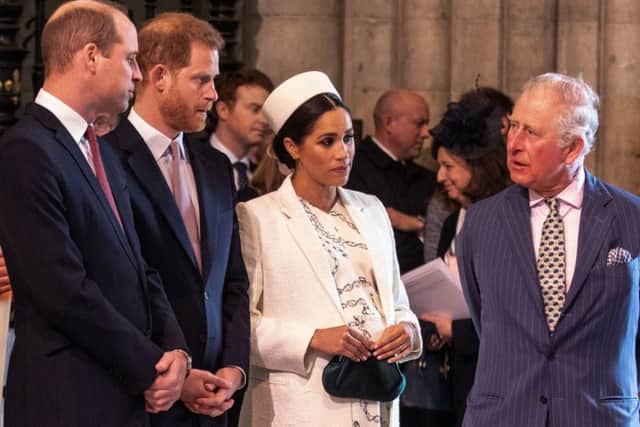 The Duchess of Sussex with her husband, Prince Charles and the Duke of Cambridge. Picture: Getty