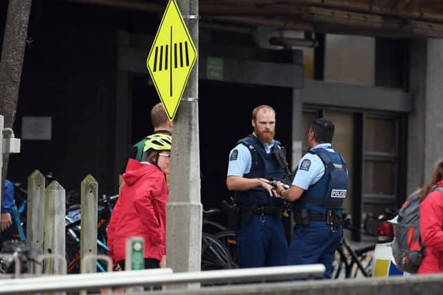 Police are seen in front of Christchurch Hospital during a lockdown on March 15, 2019 in Christchurch. (Photo by Kai Schwoerer/Getty Images)