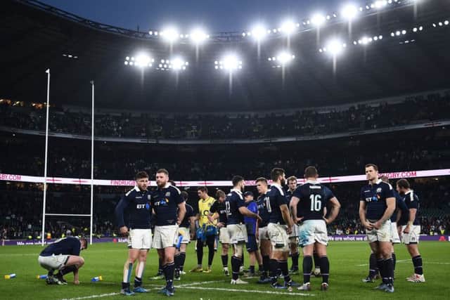 Scotland's players are dejected after suffering a heavy defeat in the 2017 Calcutta Cup at Twickenham. Picture: Getty Images