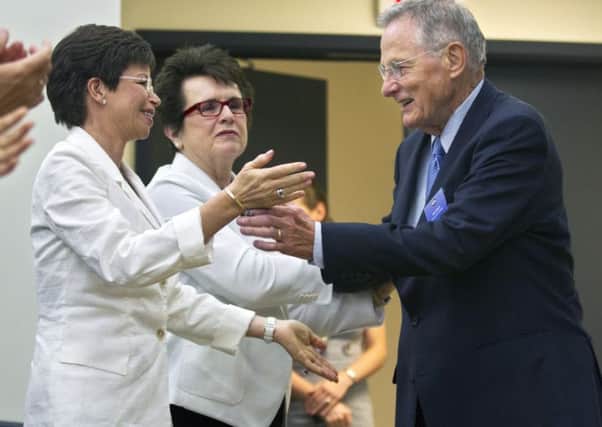 Birch Bay is applauded by Senior Adviser to the President and Chair of the Council on Women and Girls Valerie Jarrett, and tennis great Billie Jean King in 2012. Picture: AP