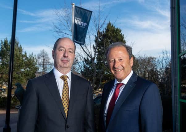 Non-executive directors Martyn Everett (left) and Clive Fenton at Stewart Milne Group HQ. Picture: Contributed