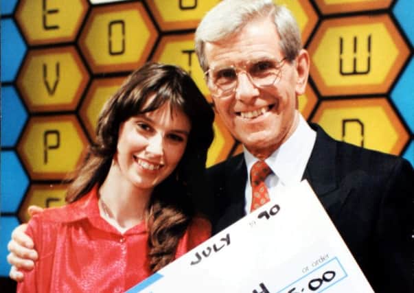 Claire Scott from Port Glasgow with Bob Holness on the 1990s champion Blockbuster show (Picture: HEMEDIA)