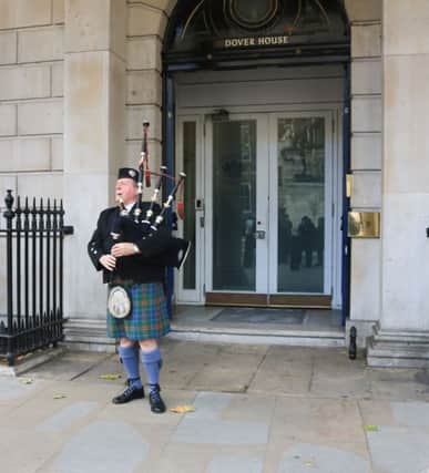 A piper plays the Bagpipes outside Scotland Office Dover House in Whitehall. Pic: Amer Ghazzal/REX/Shutterstock