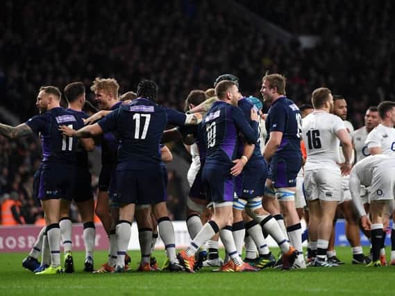 Scotland celebrate after scoring a try in the second half