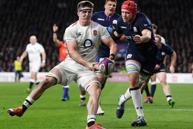 Overpowered by England's pack in the first half, but fared better in the second.