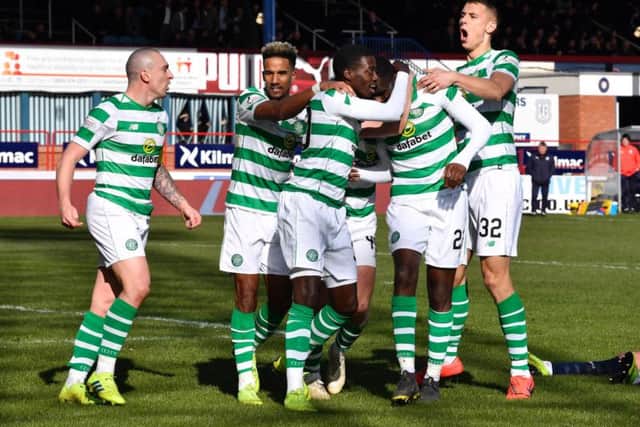 Celtic players celebrate Odsonne Edouard's winner. Picture: SNS