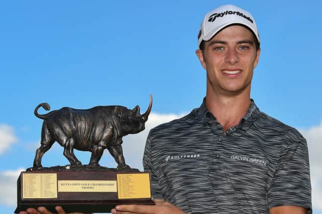 Italy's Guido Migliozzi shows off the trophy after his one-shot win at Karen Country Club. Picture: Getty Images