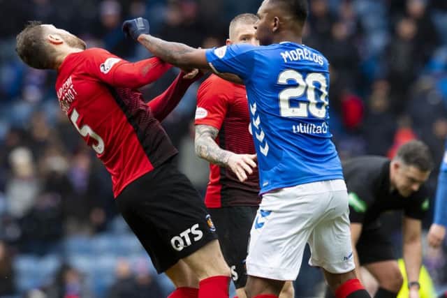 Alfredo Morelos (right) clashes with Kilmarnock's Kirk Broadfoot. Picture: SNS Group