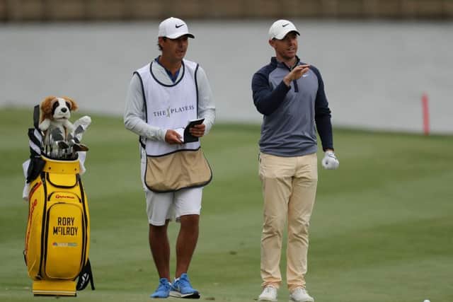 Rory McIlroy with caddy Harry Diamond during his triumphant final round at The Players Championship. Picture: Richard Heathcote/Getty