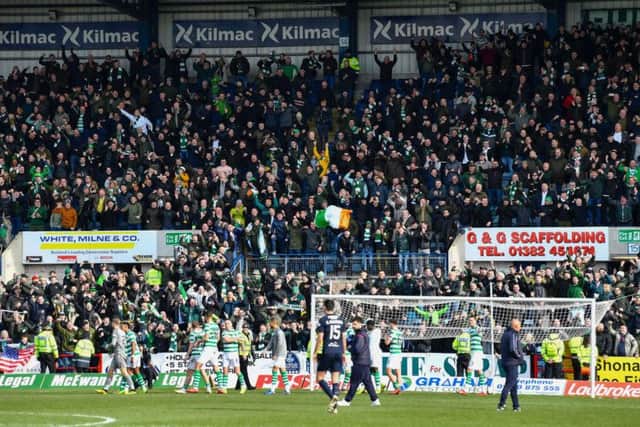 Celtic fans celebrate victory over Dundee. Picture: SNS