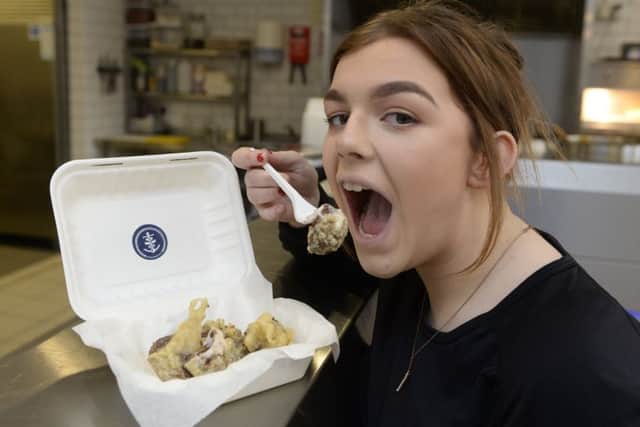 Karli Anderson, 16, from Off the Hook in Airdrie, Scotland, tried out the deep fried Cadburys Creme Egg. Picture: SWNS