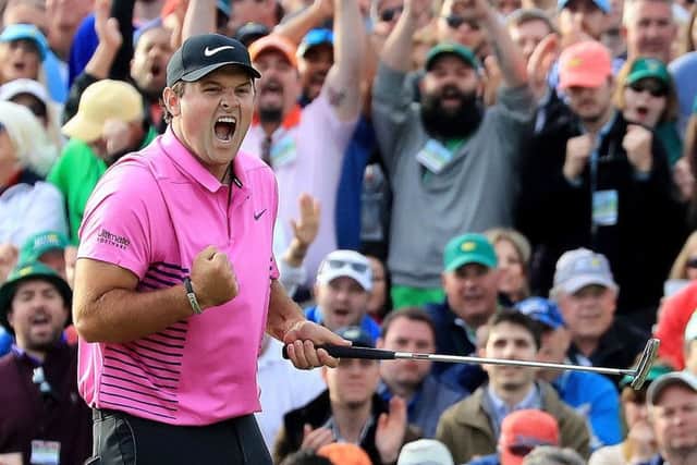 Patrick Reed celebrates after making par on the 18th green to win the 2018 Masters. Picture: David Cannon/Getty Images