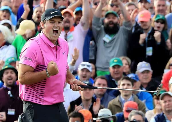 Patrick Reed celebrates after making par on the 18th green to win the 2018 Masters. Picture: David Cannon/Getty Images