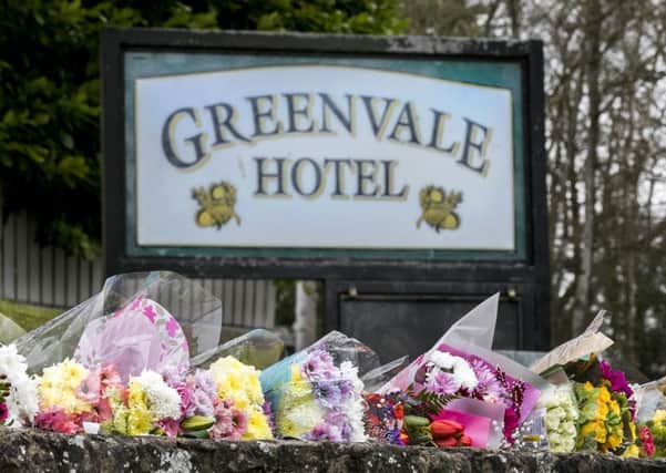 Floral tributes outside The Greenvale Hotel in Cookstown, Co. Tyrone, in Northern Ireland. Picture: Liam McBurney/PA Wire