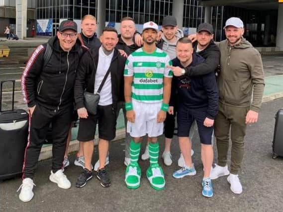 Shay Logan uploaded a picture of him wearing a full Celtic kit