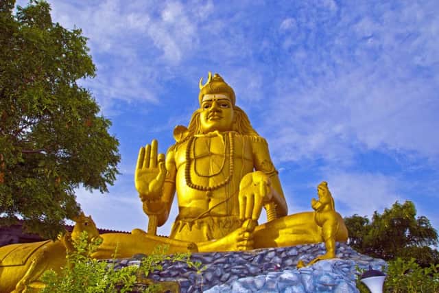 The Golden Statue of Shiva, one of many at the at the cliff-top Koneswaram Temple, Trincomalee