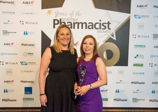 Cat Seller, Well Pharmacy Kilsyth, celebrates with award sponsor, Emma Lavender, Positive Solutions