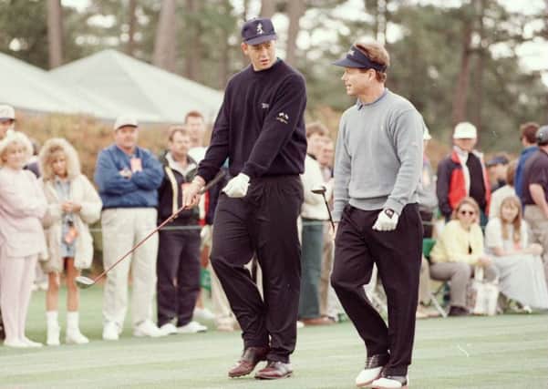 Gordon Sherry, left, chats to Tom Watson during a practice round ahead of the 1996 Masters. Picture: Stephen Munday/Allsport