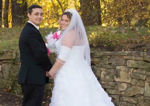 Ashley Heil and Ben on their wedding day. Picture: SWNS