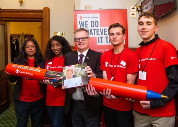Brendan O'Hara MP for Argyll and Bute with Save the Children supporters Gift Odokor, Patience Ambe Nsameji, Tim Humphreys and Alfie Blake.