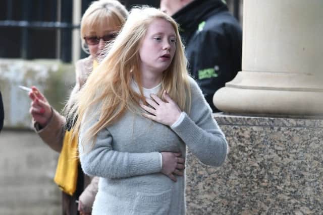 Georgina Lochrane leaves court. Picture: John Devlin