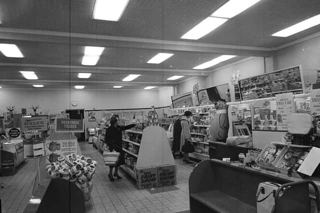 The Juniper Green branch had self-service. Customers were happy to leave their shopping bags on the shelves in the foreground.